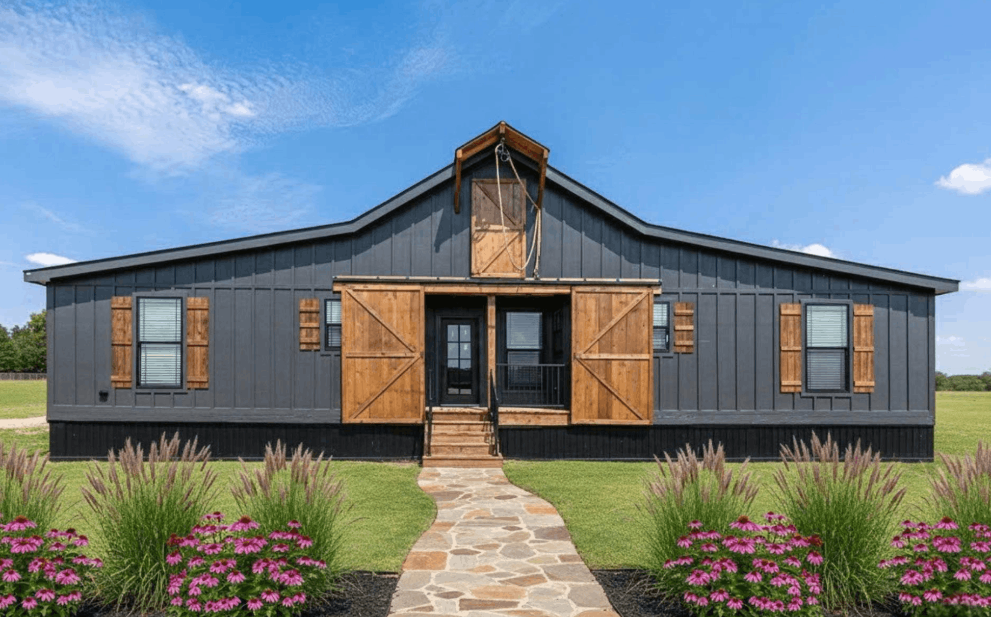 The old hay barn elevation, exterior, and hero home features