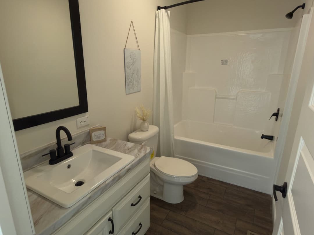 The woodside b bathroom home features