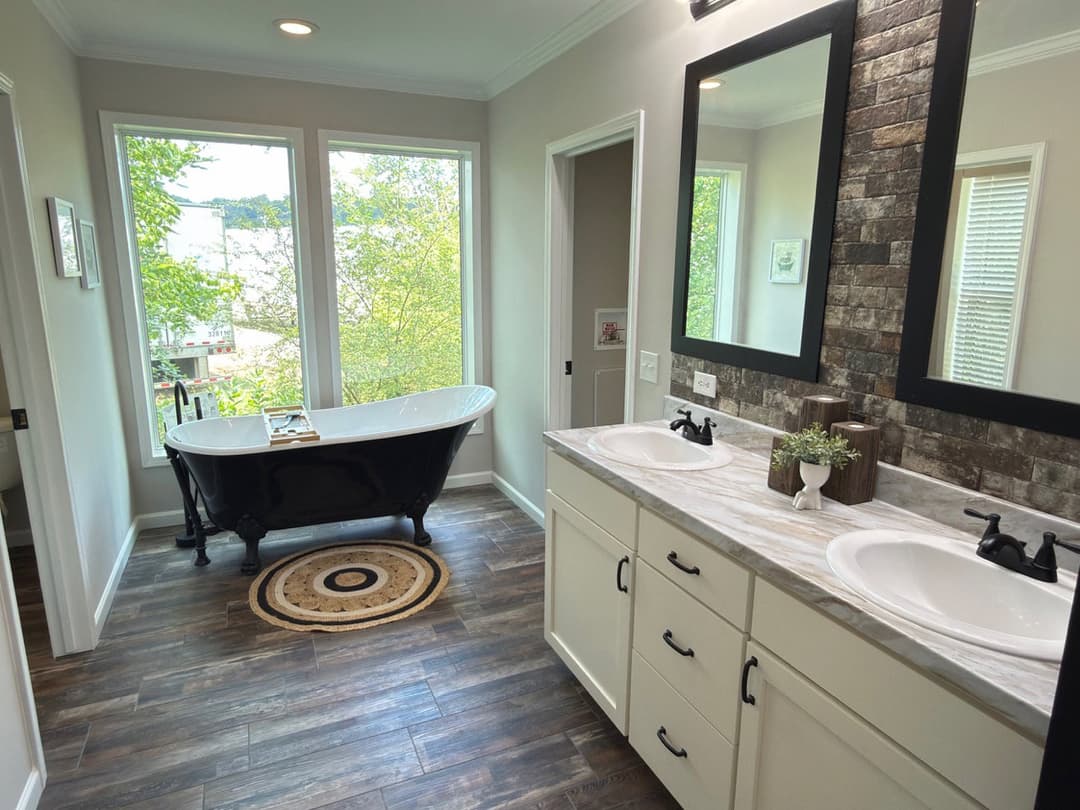 The woodside c bathroom home features