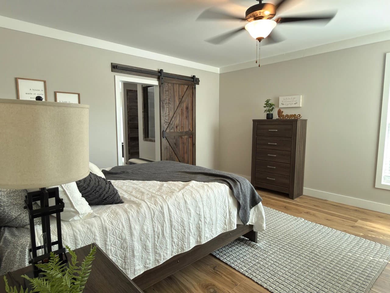 The barndominium bedroom home features